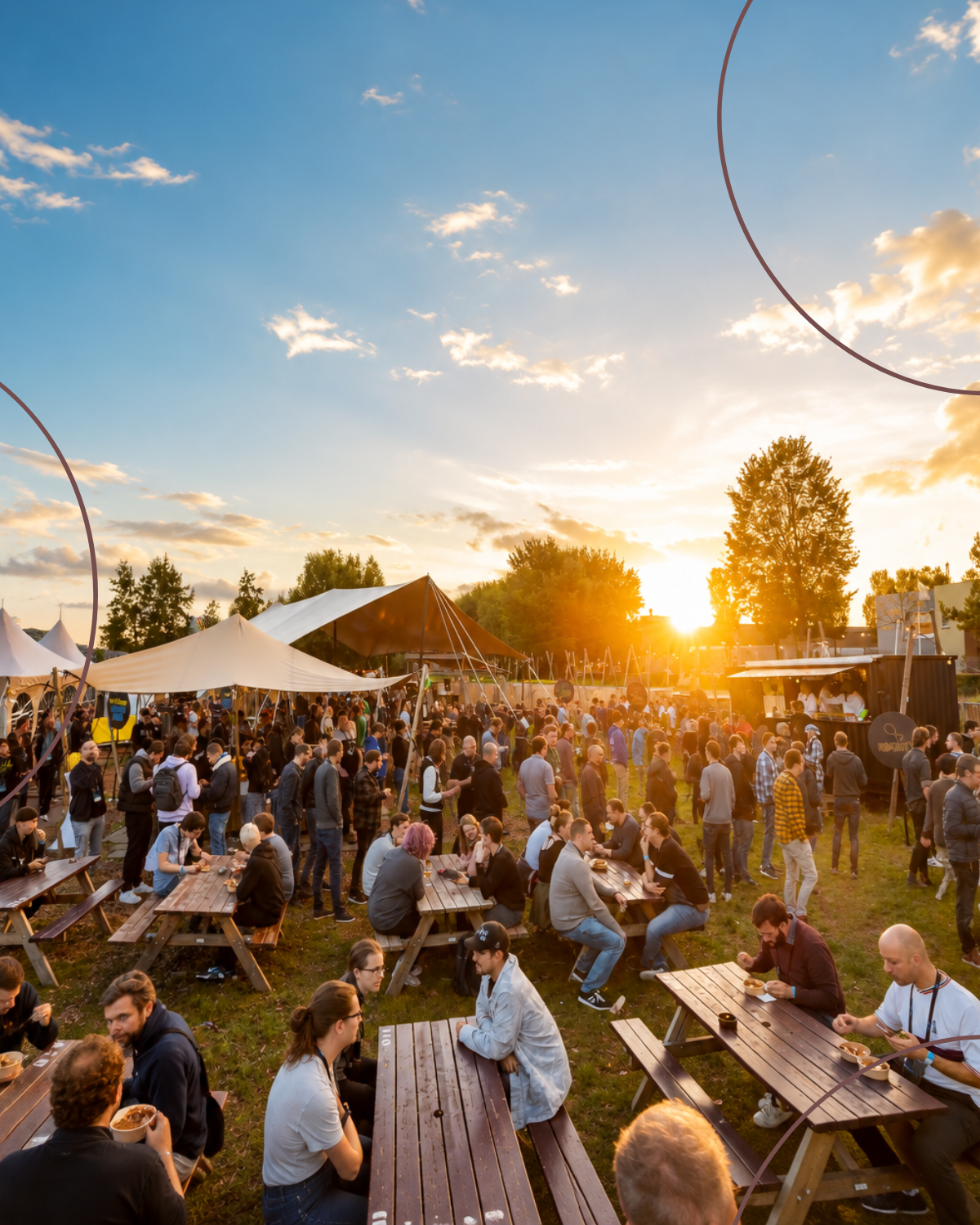 Food festival with food trucks and fairy lights at sunset