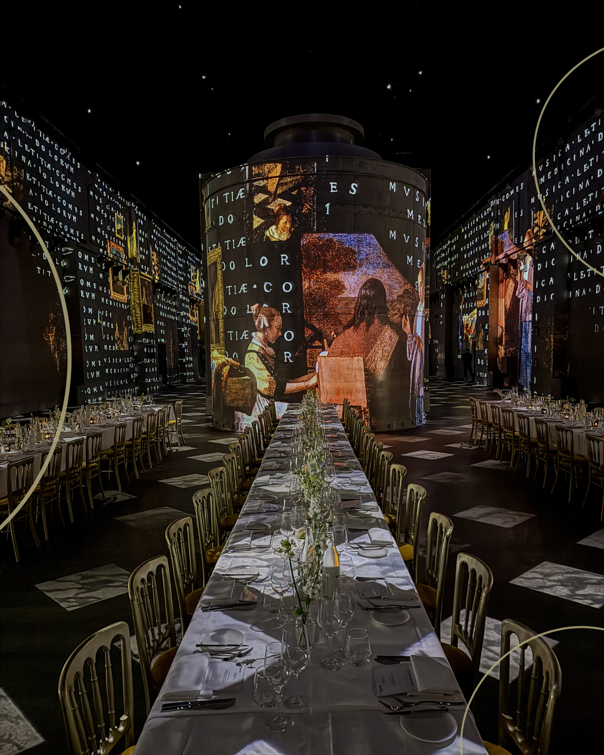Long dressed table for a sit-down dinner by candlelight